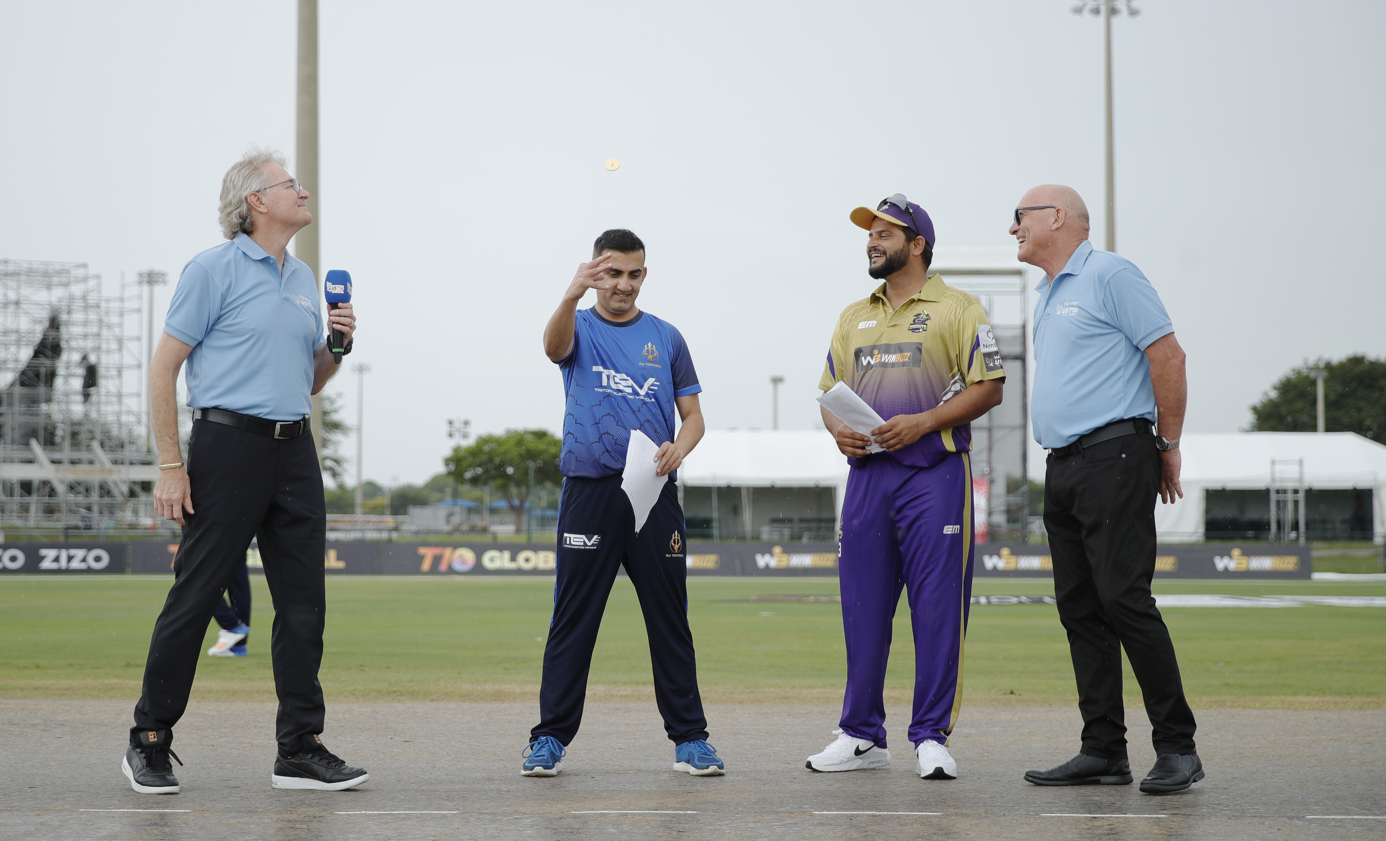 Gautam Gambhir (c) of NJ Tritons flipping the toss coin and SURESH RAINA (c) of California Knights call for it  during match 1 of the US Masters T10 League between the Atlanta Riders and the Texas Chargers at the Central Broward Park in Lauderhill, Florida on the 18 August 2023Photo by Saikat Das / ACEIMAGES for US Masters T10