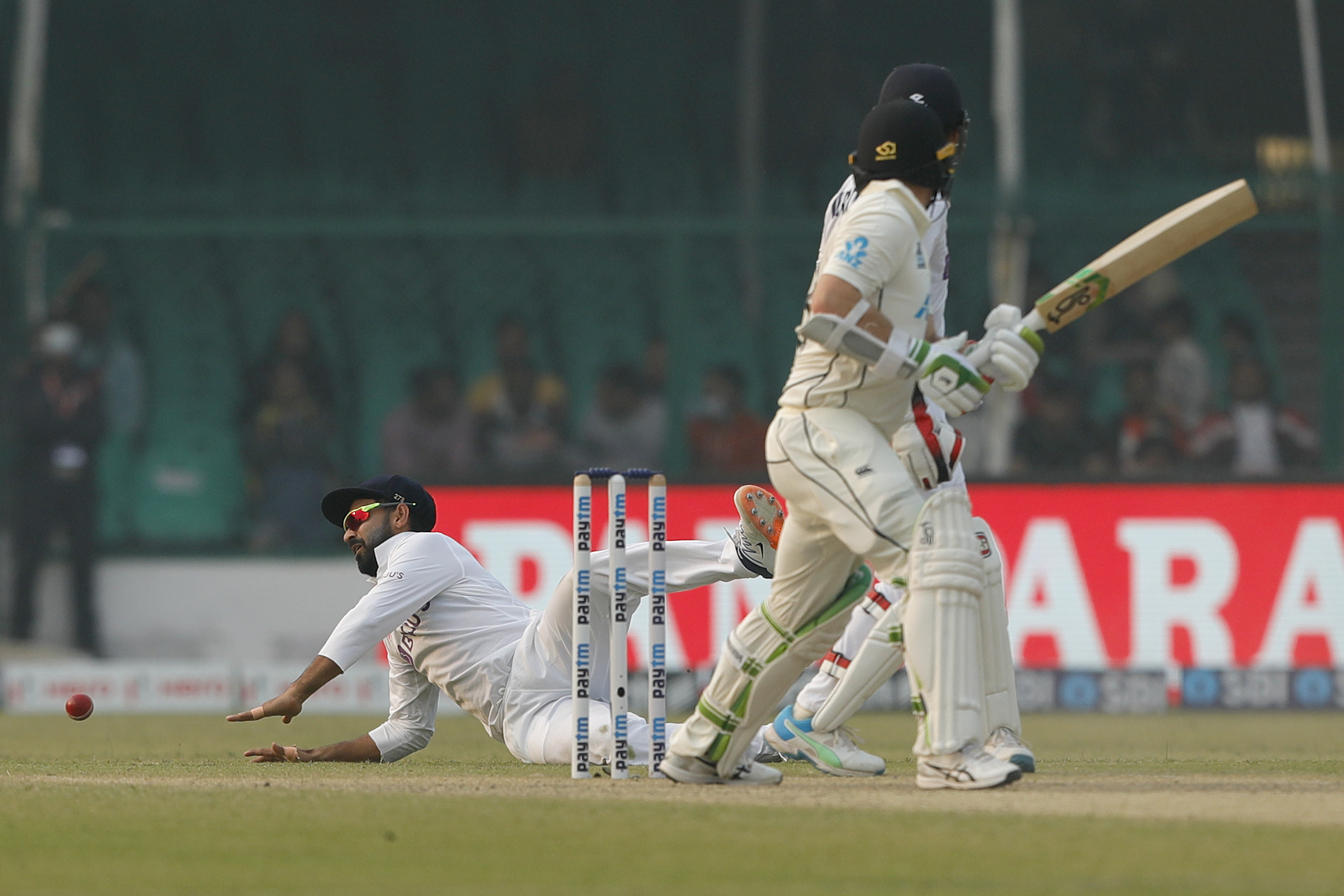 Ajinkya Rahane (Captain) of India trying to take a catch during day two of the 1st Test match between India and New Zealand held at the Green Park International Stadium in Kanpur on the 26th November 2021Photo by Saikat Das / Sportzpics for BCCI