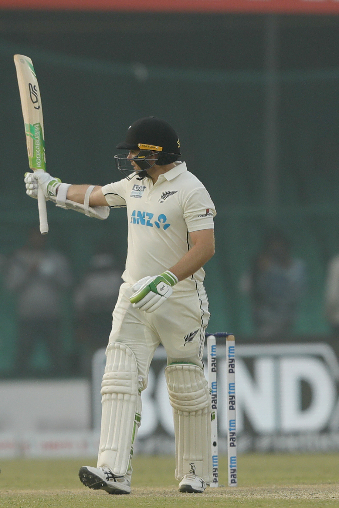 Tom Latham of New Zealand celebrating his half century  during day two of the 1st Test match between India and New Zealand held at the Green Park International Stadium in Kanpur on the 26th November 2021Photo by Saikat Das / Sportzpics for BCCI