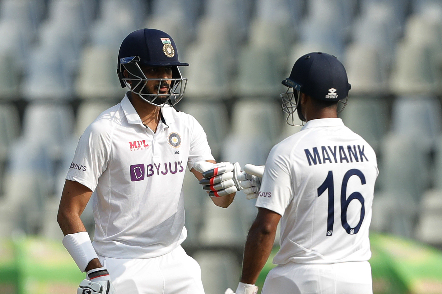 Axar Patel of India and Mayank Agarwal of India  during day two of the 2nd test match between India and New Zealand held at the Wankhede Stadium in Mumbai on the 4th December 2021Photo by Saikat Das / Sportzpics for BCCI