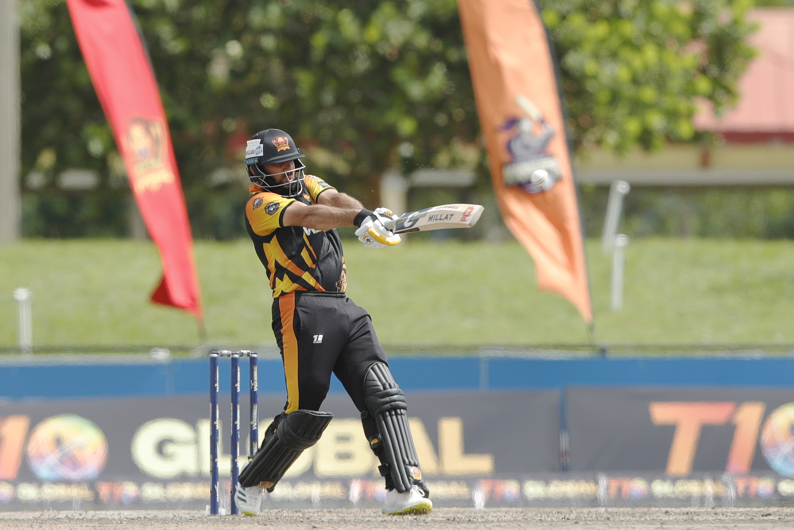 Richard Ernst Chad Levi of New York Warriors hitting a over boundary Misbah-ul-Haq (c) of New York Warriors hitting a four during match 22, Qualifier 1 of the US Masters T10 League between the New York Warriors and the California Knights at the Central Broward Park in Lauderhill, Florida on the 26th August 2023 Photo by Saikat Das / ACEIMAGES for US Masters T10