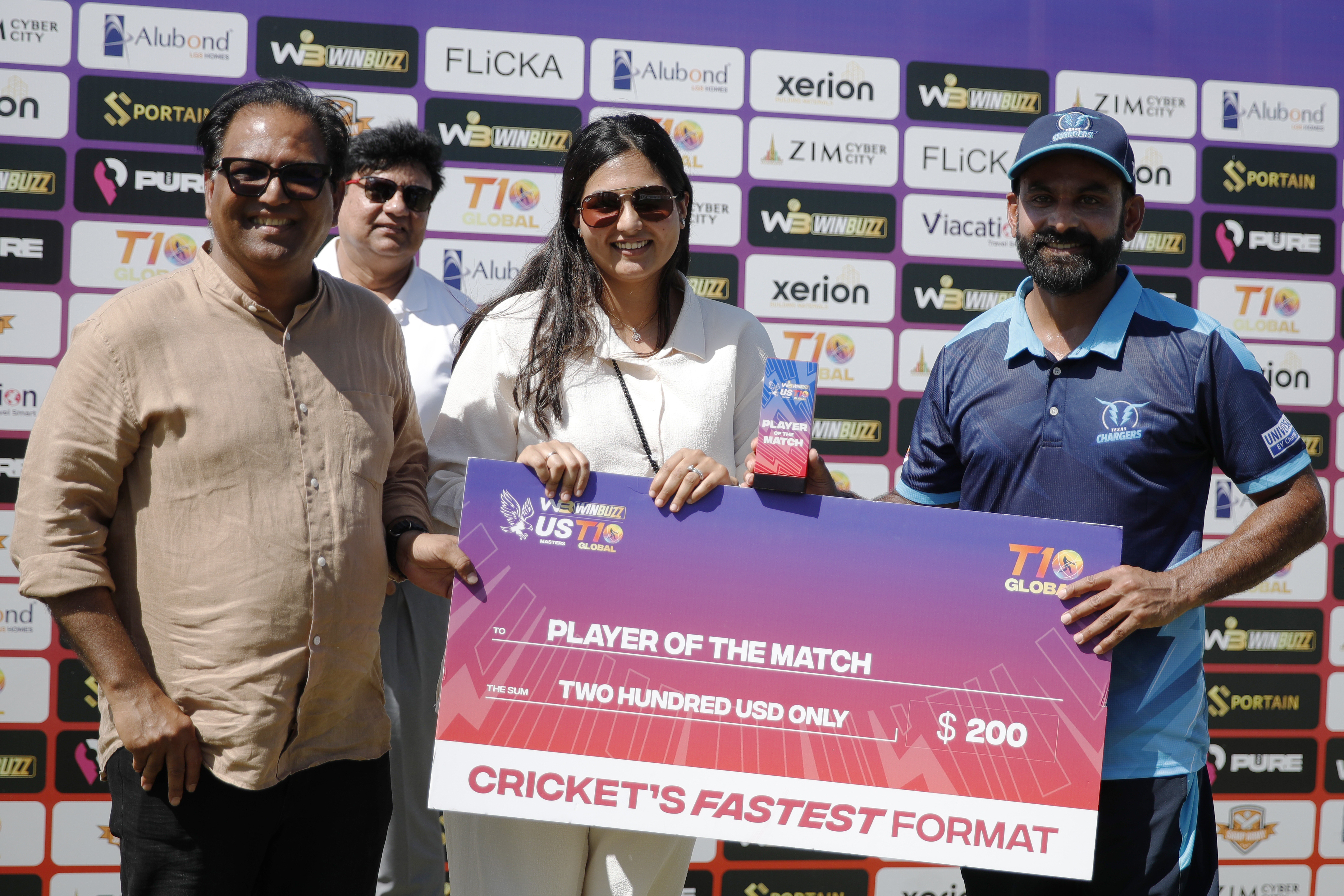 Mohammad Hafeez of Texas Chargers with Player of the Match award along with Nawab Shaji Ul Mulk The Founder & Chairman of T Ten Sports Management & T Ten Global Sports and his family during match 24, Qualifier 2 of the US Masters T10 League between the Texas Chargers and the California Knights at the Central Broward Park in Lauderhill, Florida on the 26th August 2023 Photo by Saikat Das / ACEIMAGES for US Masters T10