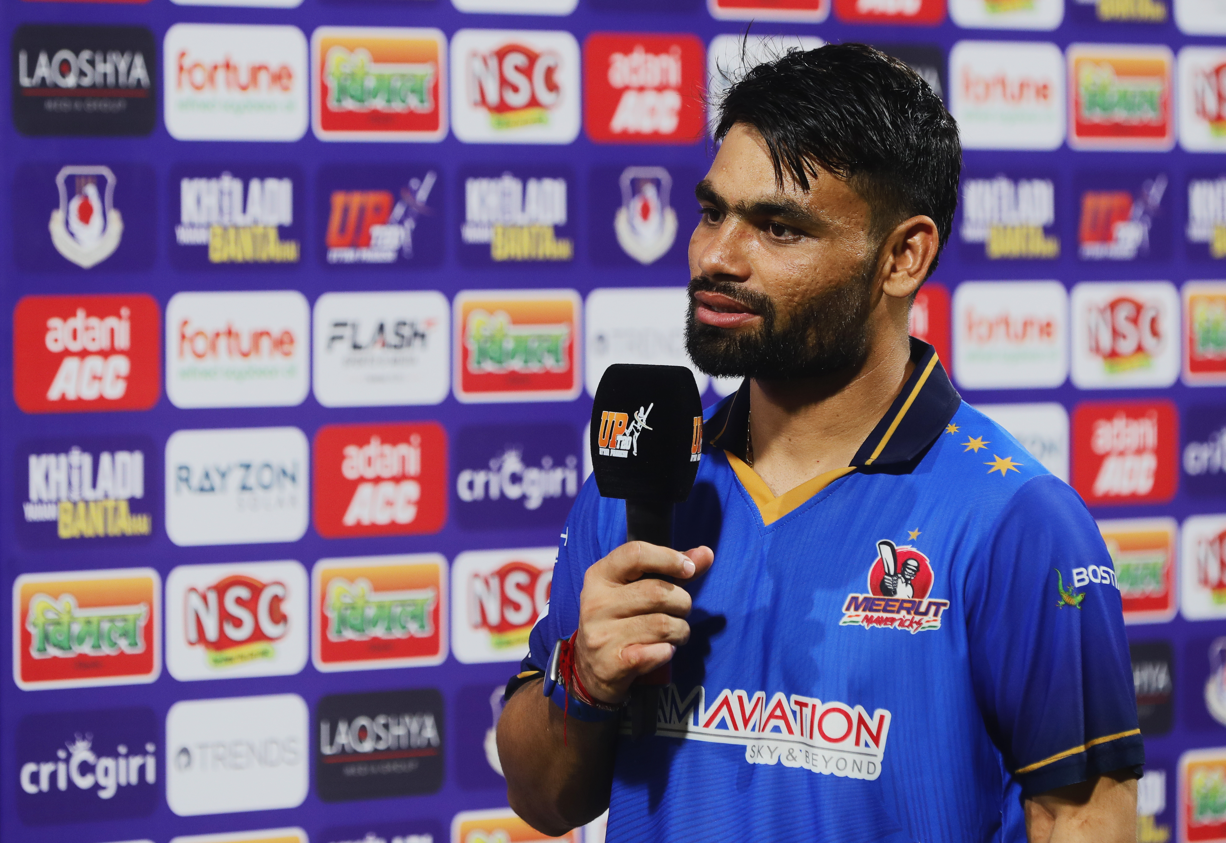 Rinku Singh of Meerut Mavericks at tv interview during the UPT20 League 2026 Season 4 opening clash between Kashi Rudras and defending champions Meerut Mavericks at Bharat Ratna Shri Atal Bihari Vajpayee Ekana Cricket Stadium, Lucknow, Uttar Pradesh, India, intense evening T20 action lights up Match 1 of the tournament.Photos by: s Saikat Das / aceimages.in for UPT20