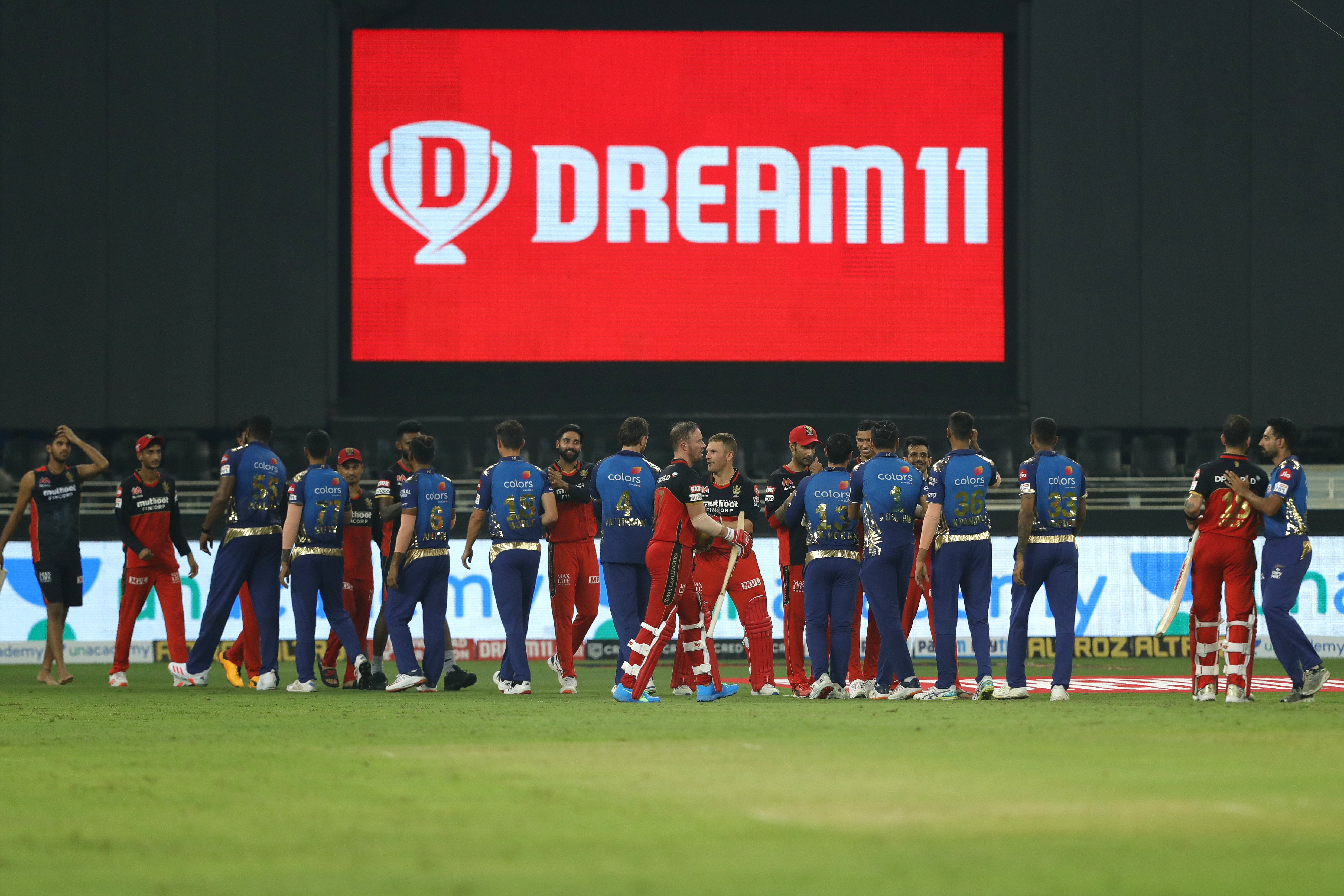 The Royal Challengers Bangalore  celebrates the win during match 10 of season 13 of the Dream 11 Indian Premier League (IPL) between The Royal Challengers Bangalore and The Mumbai Indians held at the Dubai International Cricket Stadium, Dubai in the United Arab Emirates on the 28th September 2020.  Photo by: Saikat Das  / Sportzpics for BCCI