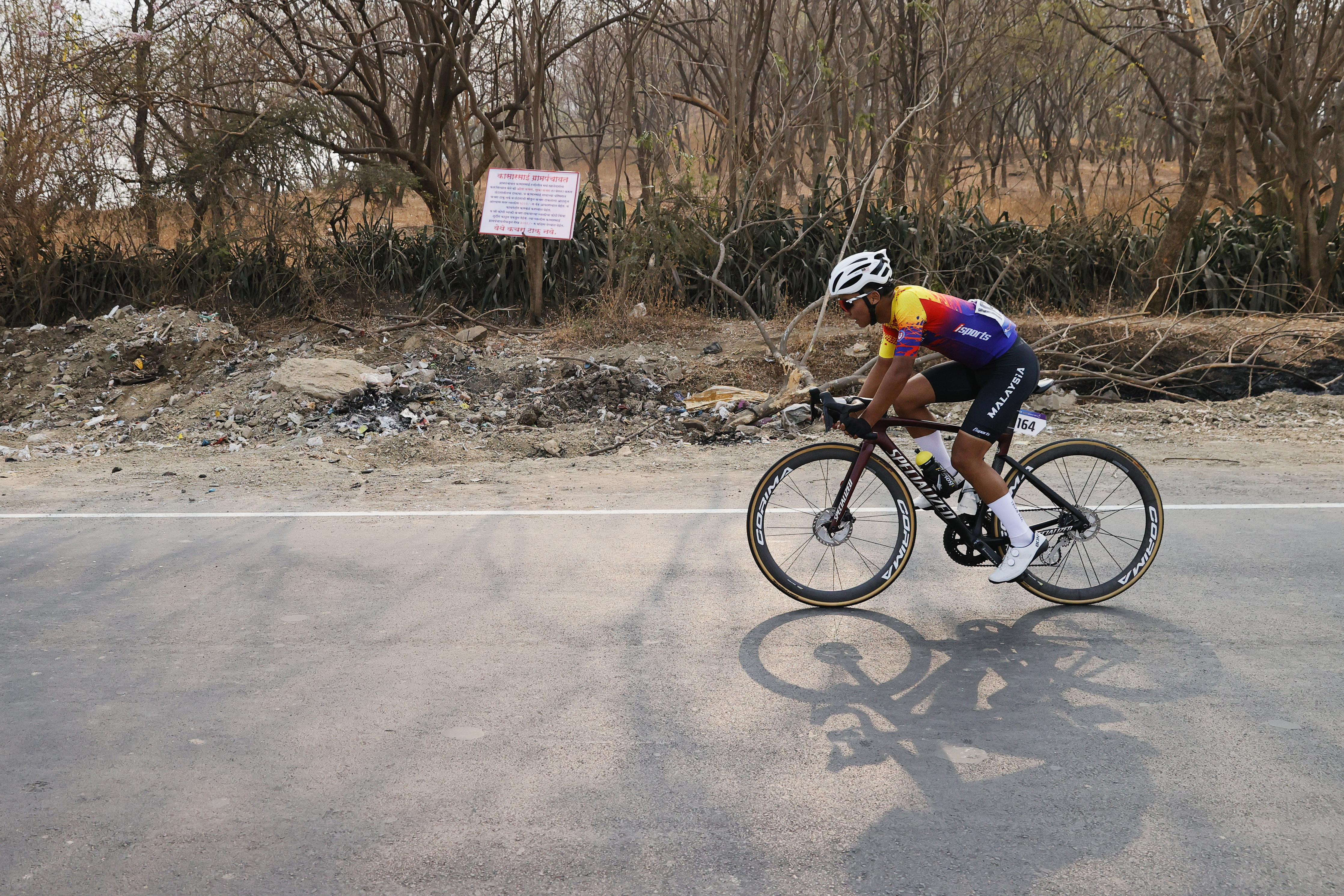 Riders Zooming past the country side during stage one of the Pune Grand Tour 2026 held in the City of Pune on the 20th January 2026.  The Pune Grand Tour marks India’s first entry into the global professional cycling calendar.   Owing to its UCI classification the PGT2026 will offer riders the opportunity to earn valuable ranking points that count toward qualification for the LA 2028 Summer Olympics.Photo by s Saikat Das / Sportzpics / PGT