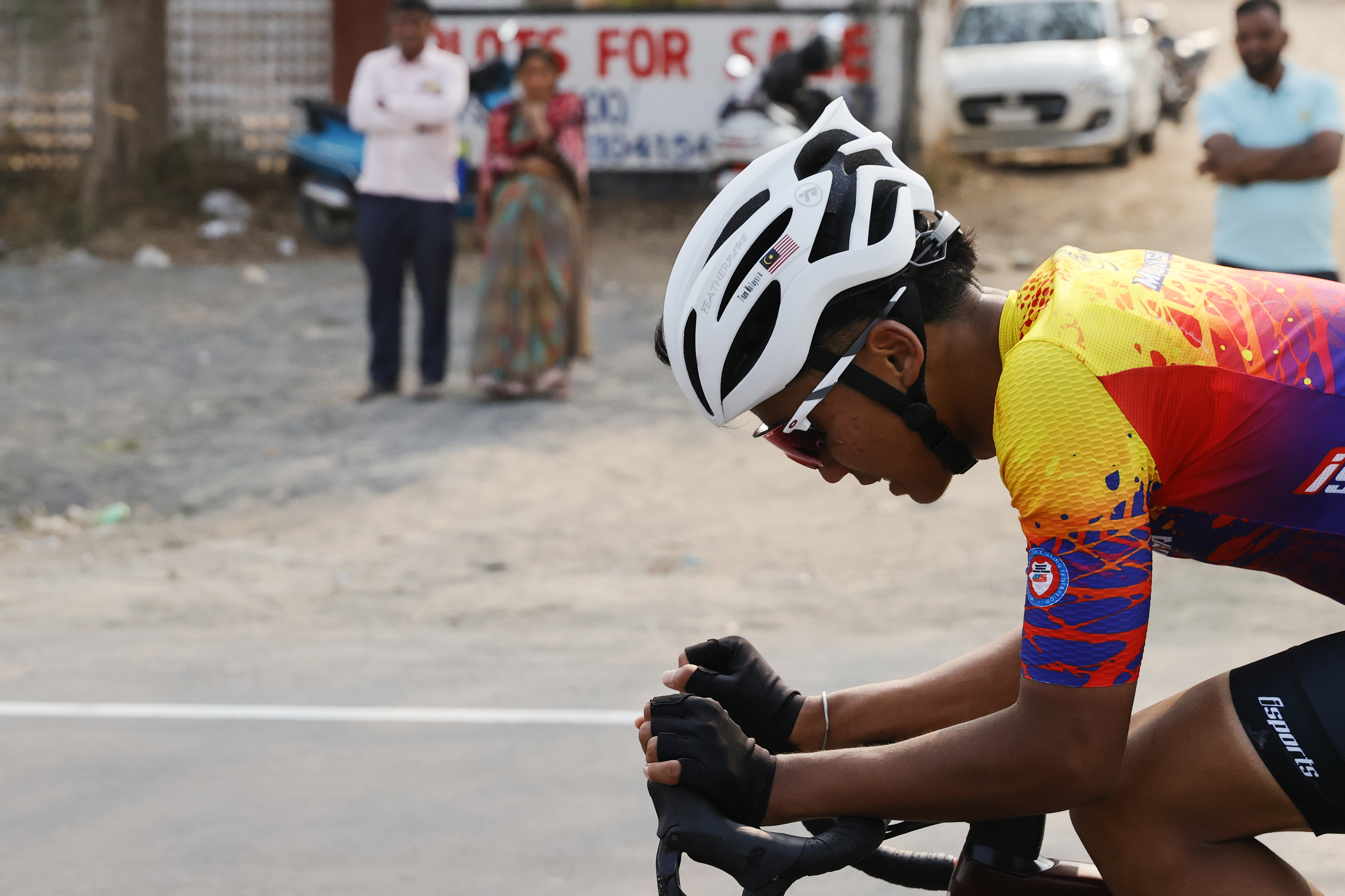 Riders Zooming past the country side during stage one of the Pune Grand Tour 2026 held in the City of Pune on the 20th January 2026.  The Pune Grand Tour marks India’s first entry into the global professional cycling calendar.   Owing to its UCI classification the PGT2026 will offer riders the opportunity to earn valuable ranking points that count toward qualification for the LA 2028 Summer Olympics.Photo by s Saikat Das / Sportzpics / PGT