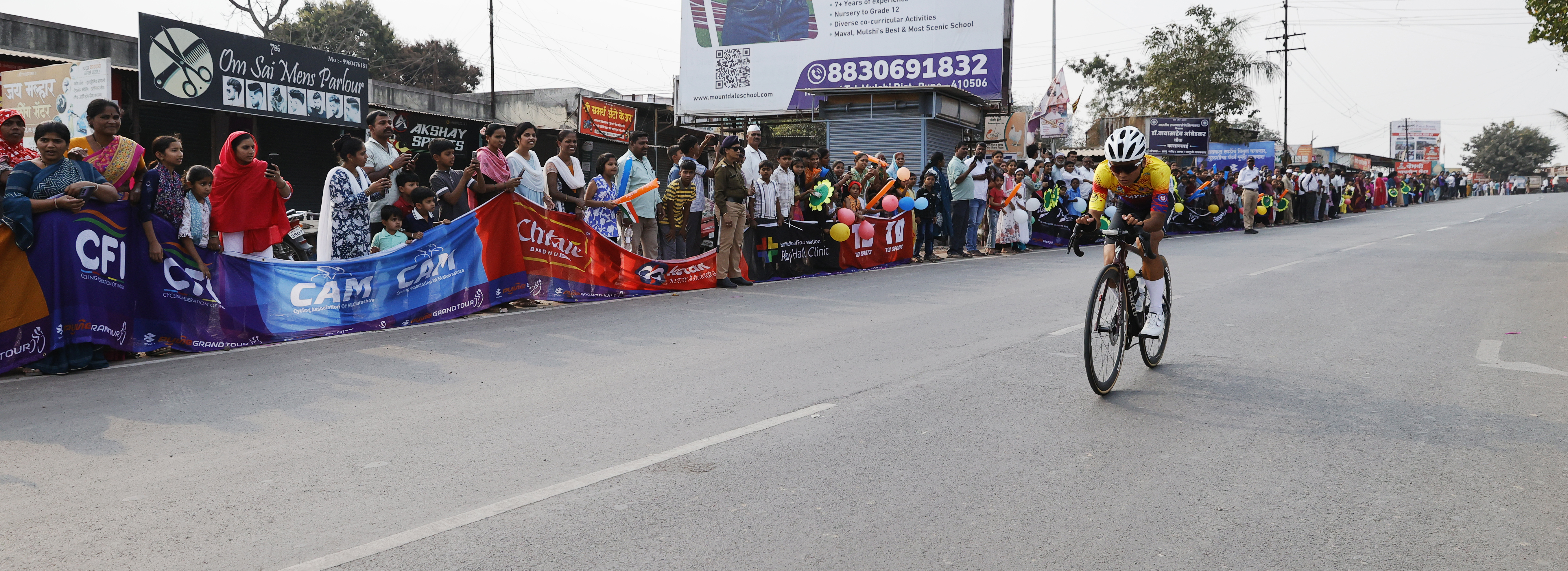Riders Zooming past the country side during stage one of the Pune Grand Tour 2026 held in the City of Pune on the 20th January 2026.  The Pune Grand Tour marks India’s first entry into the global professional cycling calendar.   Owing to its UCI classification the PGT2026 will offer riders the opportunity to earn valuable ranking points that count toward qualification for the LA 2028 Summer Olympics.Photo by s Saikat Das / Sportzpics / PGT