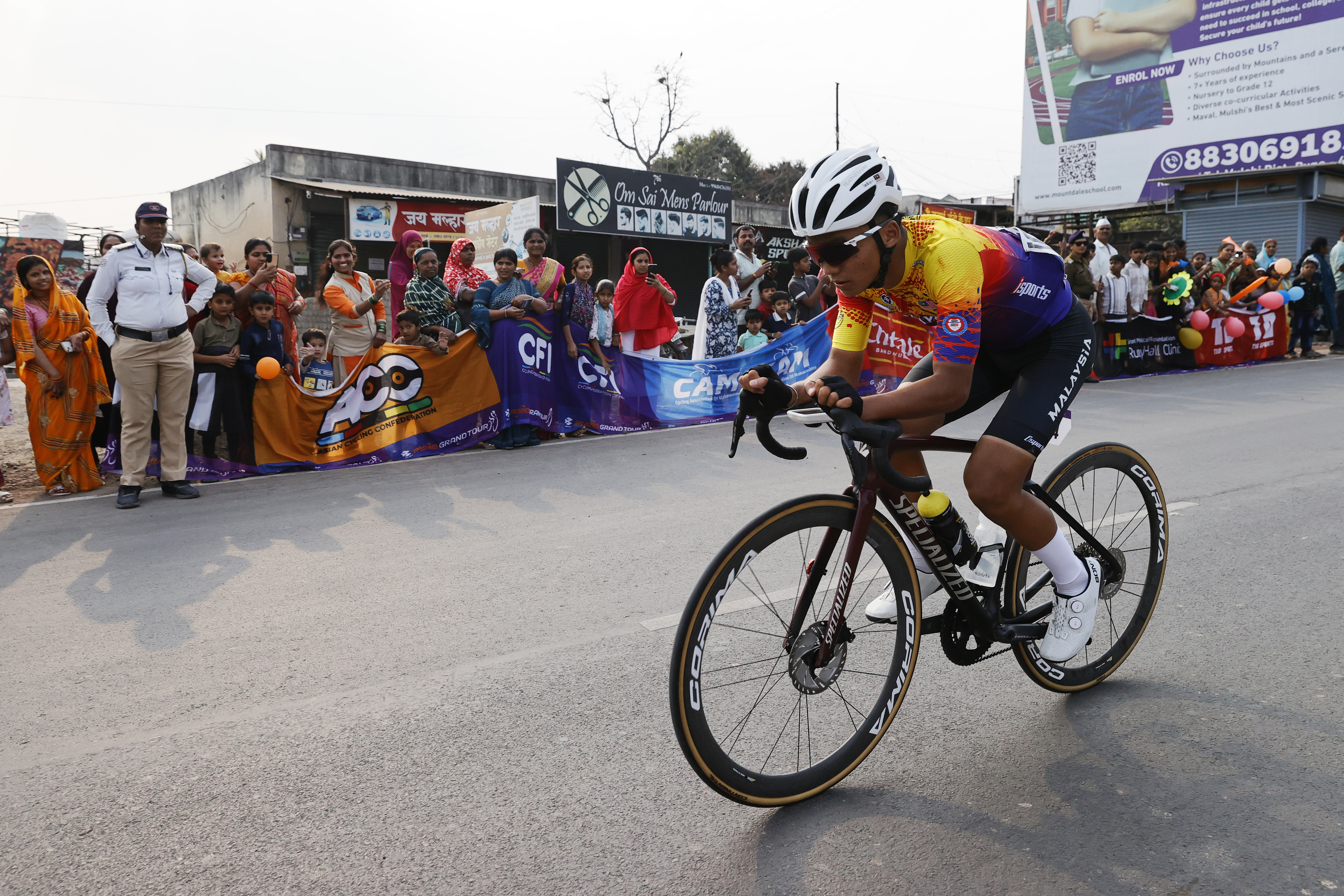 Riders Zooming past the country side during stage one of the Pune Grand Tour 2026 held in the City of Pune on the 20th January 2026.  The Pune Grand Tour marks India’s first entry into the global professional cycling calendar.   Owing to its UCI classification the PGT2026 will offer riders the opportunity to earn valuable ranking points that count toward qualification for the LA 2028 Summer Olympics.Photo by s Saikat Das / Sportzpics / PGT