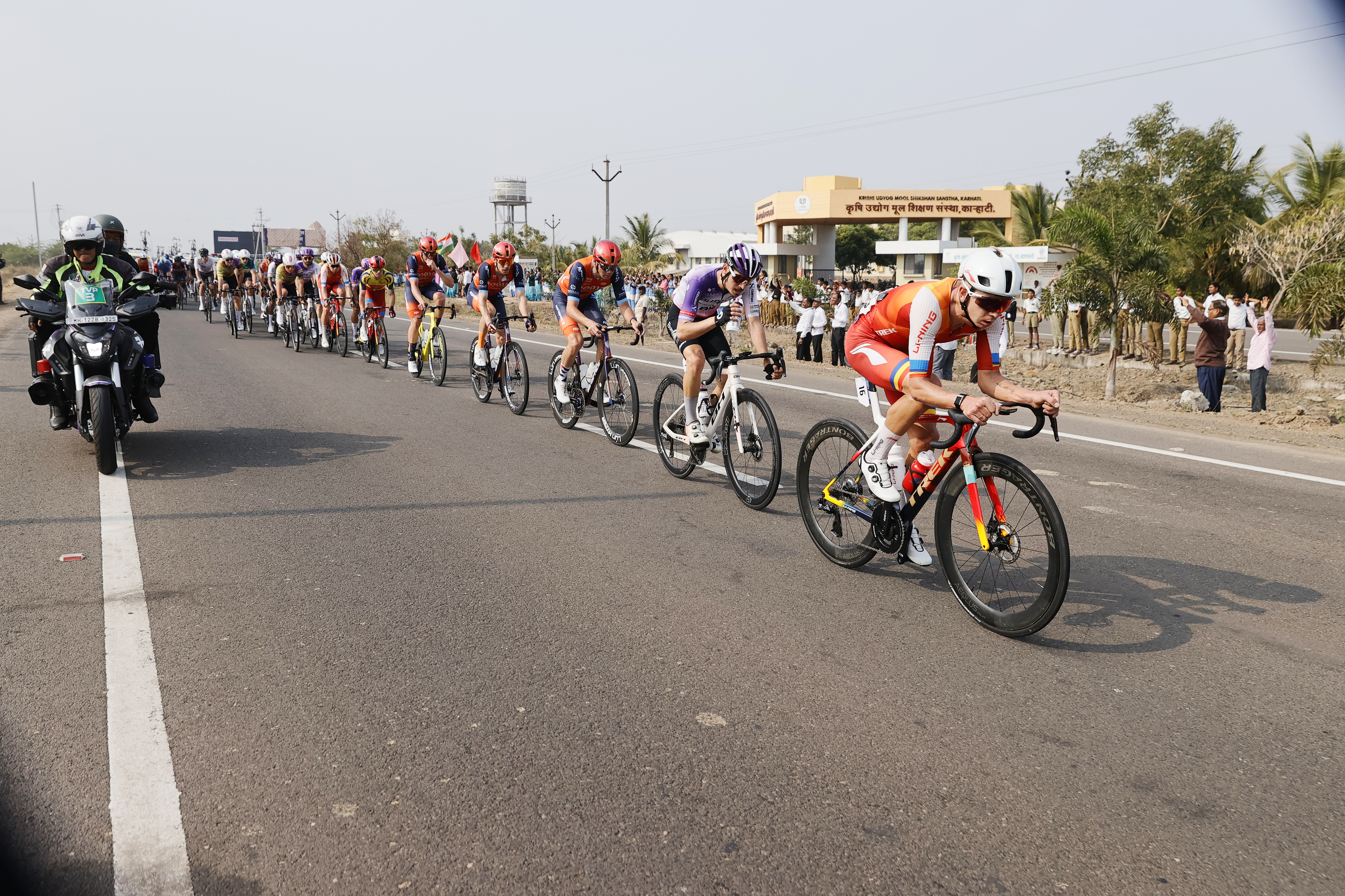 Riders zoom past the country side during stage three of the Bajaj Pune Grand Tour 2026 held in the City of Pune on the 22nd January 2026.  The Pune Grand Tour marks India’s first entry into the global professional cycling calendar.   Owing to its UCI classification the PGT2026 will offer riders the opportunity to earn valuable ranking points that count toward qualification for the LA 2028 Summer Olympics.Photo by Saikat Das /Sportzpics / PGT 2026