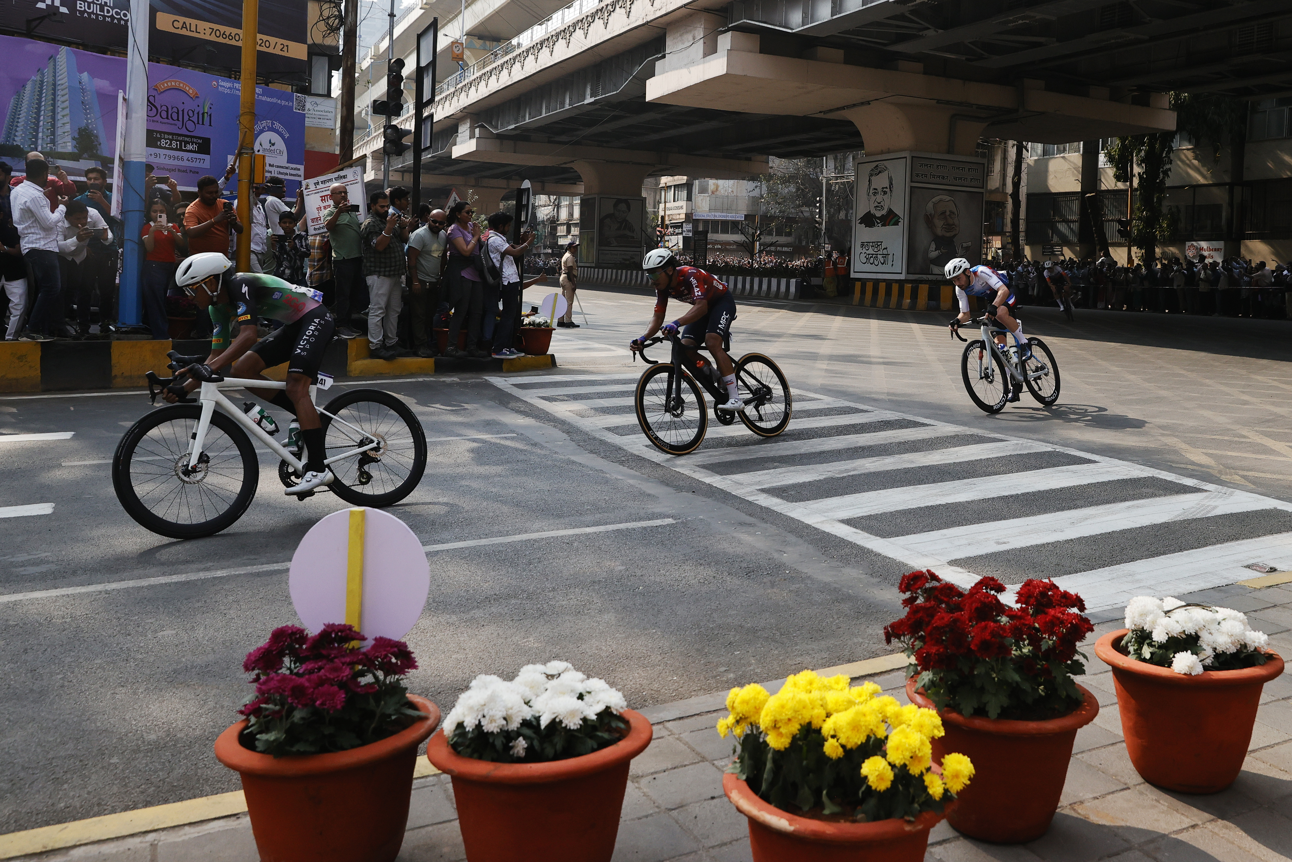 Cyclist zooming past the city during stage four of the Bajaj Pune Grand Tour 2026 held in the City of Pune on the 23rd January 2026.  The Pune Grand Tour marks India’s first entry into the global professional cycling calendar.   Owing to its UCI classification the PGT2026 will offer riders the opportunity to earn valuable ranking points that count toward qualification for the LA 2028 Summer Olympics.Photo by: s Saikat Das / Sportzpics / PGT 2026