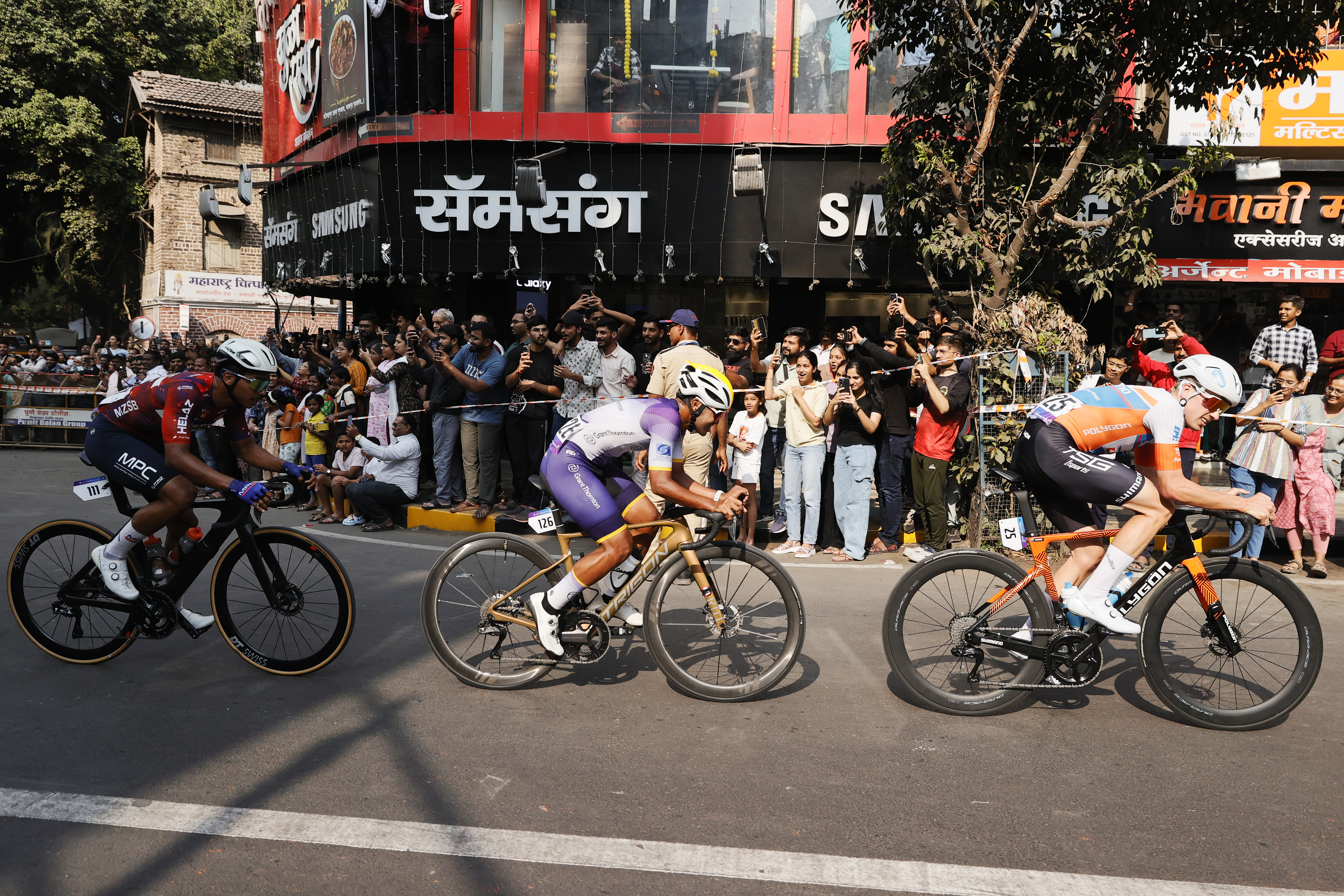 Cyclist zooming past the city during stage four of the Bajaj Pune Grand Tour 2026 held in the City of Pune on the 23rd January 2026.  The Pune Grand Tour marks India’s first entry into the global professional cycling calendar.   Owing to its UCI classification the PGT2026 will offer riders the opportunity to earn valuable ranking points that count toward qualification for the LA 2028 Summer Olympics.Photo by: s Saikat Das / Sportzpics / PGT 2026