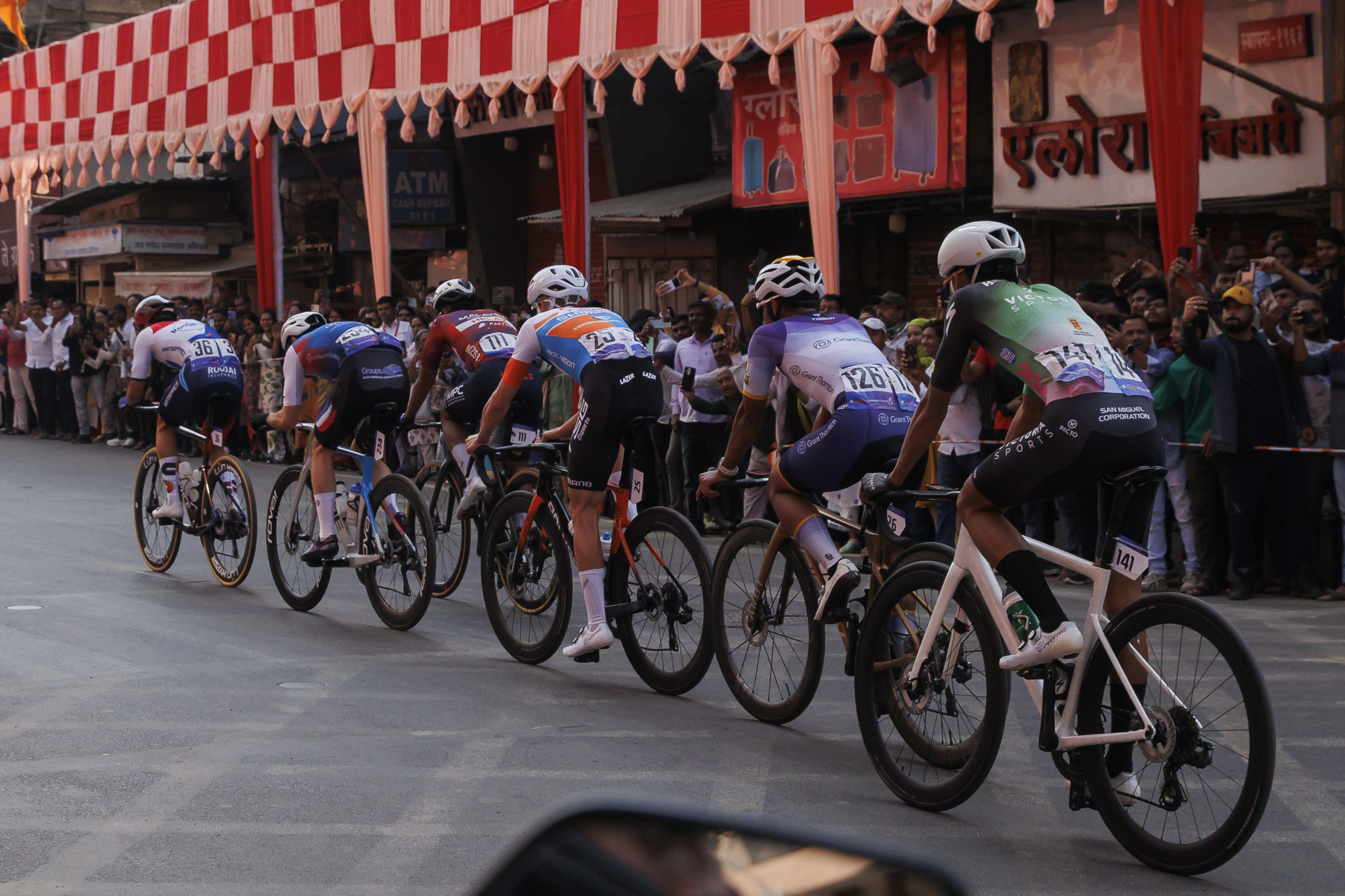 Cyclist zooming past the city during stage four of the Bajaj Pune Grand Tour 2026 held in the City of Pune on the 23rd January 2026.  The Pune Grand Tour marks India’s first entry into the global professional cycling calendar.   Owing to its UCI classification the PGT2026 will offer riders the opportunity to earn valuable ranking points that count toward qualification for the LA 2028 Summer Olympics.Photo by: s Saikat Das / Sportzpics / PGT 2026
