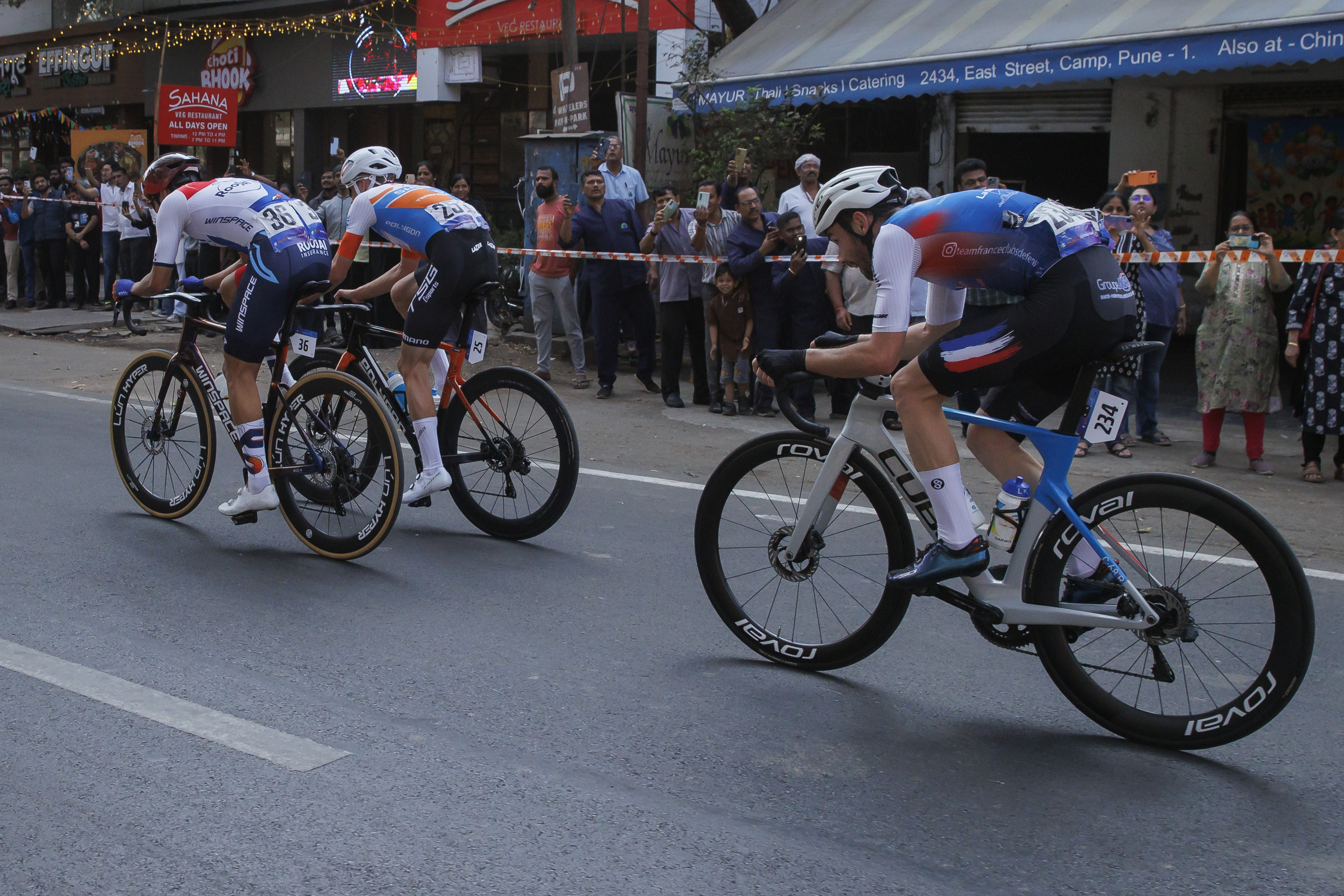 Cyclist zooming past the city during stage four of the Bajaj Pune Grand Tour 2026 held in the City of Pune on the 23rd January 2026.  The Pune Grand Tour marks India’s first entry into the global professional cycling calendar.   Owing to its UCI classification the PGT2026 will offer riders the opportunity to earn valuable ranking points that count toward qualification for the LA 2028 Summer Olympics.Photo by: s Saikat Das / Sportzpics / PGT 2026