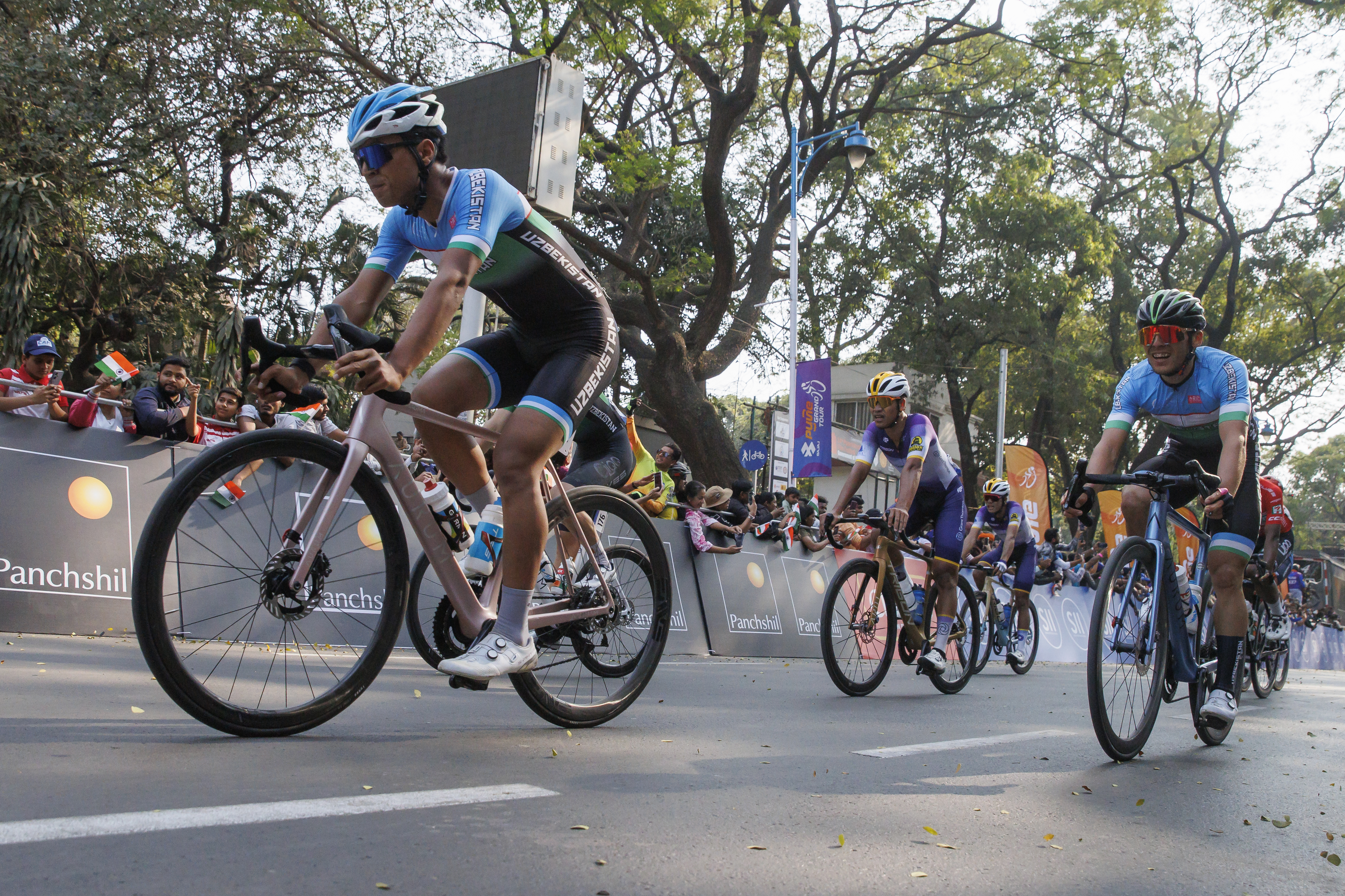 Cyclist zooming past the city during stage four of the Bajaj Pune Grand Tour 2026 held in the City of Pune on the 23rd January 2026.  The Pune Grand Tour marks India’s first entry into the global professional cycling calendar.   Owing to its UCI classification the PGT2026 will offer riders the opportunity to earn valuable ranking points that count toward qualification for the LA 2028 Summer Olympics.Photo by: s Saikat Das / Sportzpics / PGT 2026