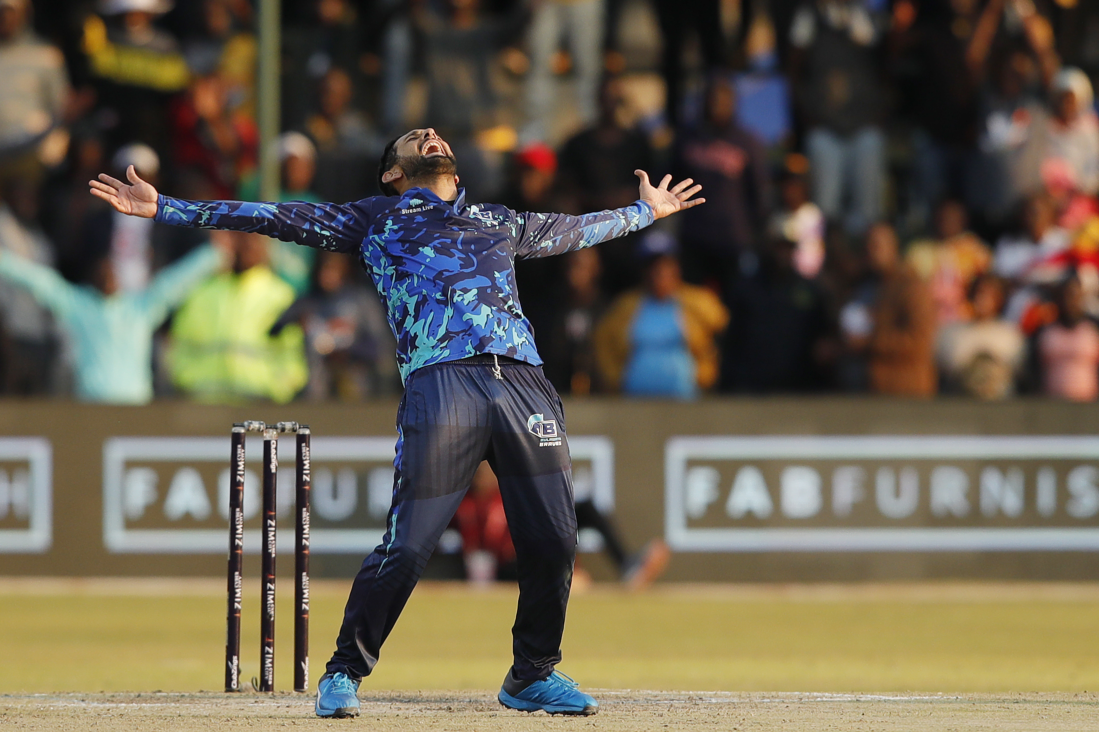 Sikander Raza (c) of Bulawayo Braves celebrating the wicket of Irfan Pathan of Harare Hurricanes during match 1 of the Zim Afro T10 League between the HARARE HURRICANES and the BULAWAYO BRAVES held at the Harare Sports Club in the Zimbabwe on the 21st July 2023Photo by Saikat Das / ACEIMAGES for Zim Afro T10